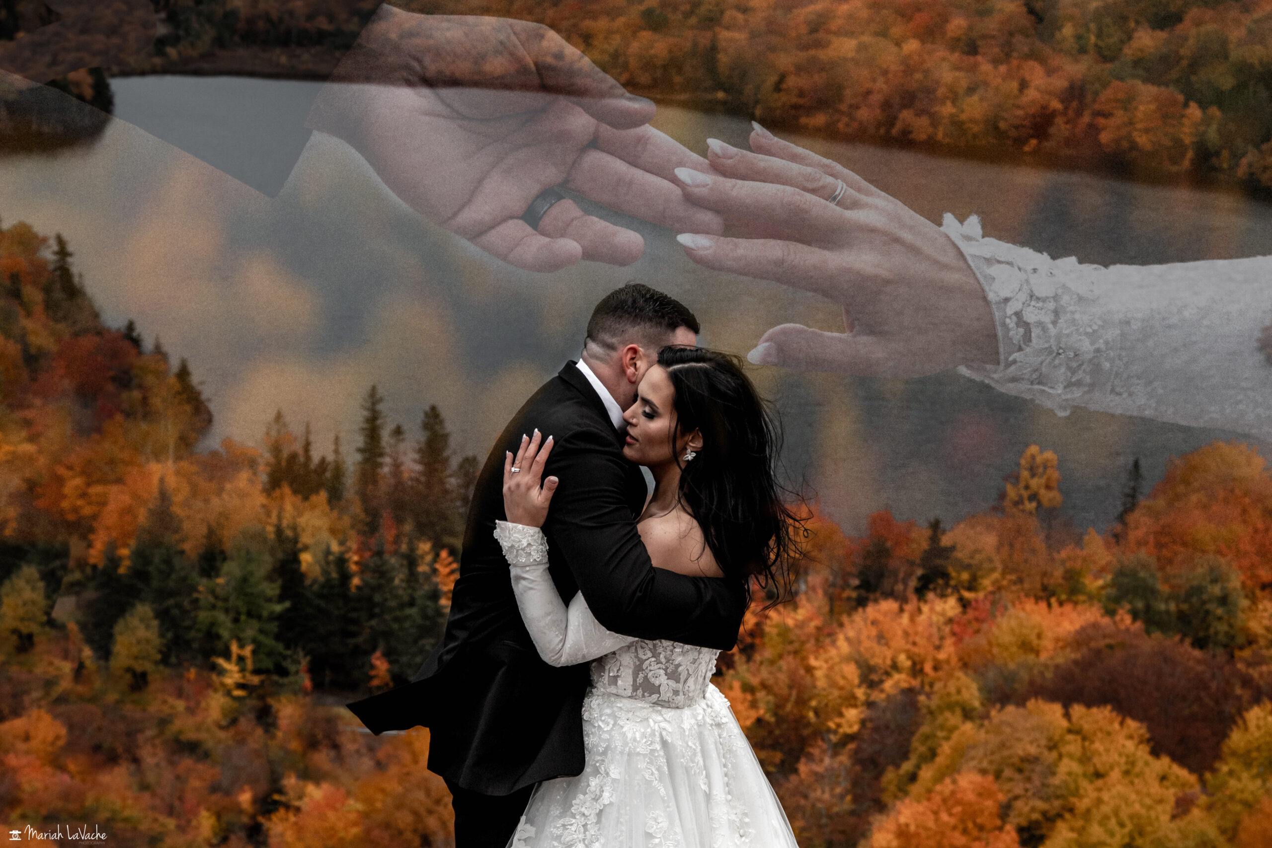 bride and groom hugging and holding hands while eloping on new hampshire mountain with fall foliage and lake